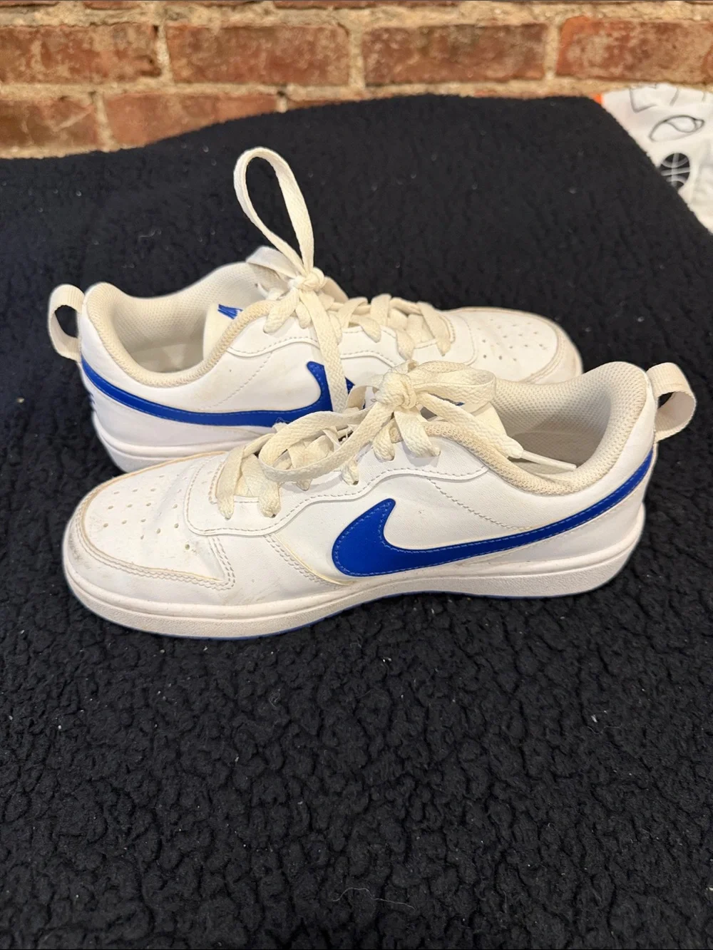 Nike Kids White Sneakers with Blue Swoosh